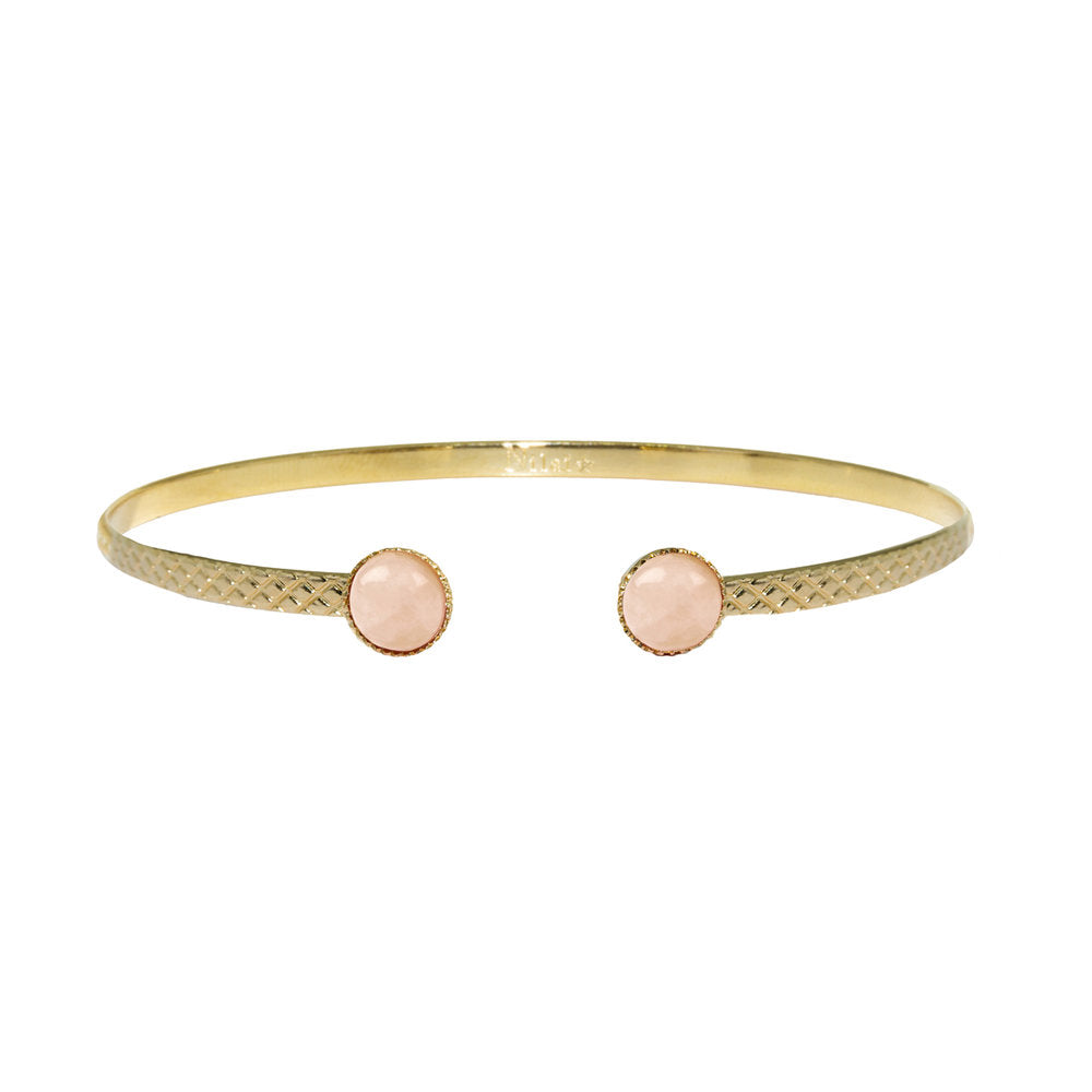Jonc athéna gaufré fini doré orné d'une pierre quartz rose