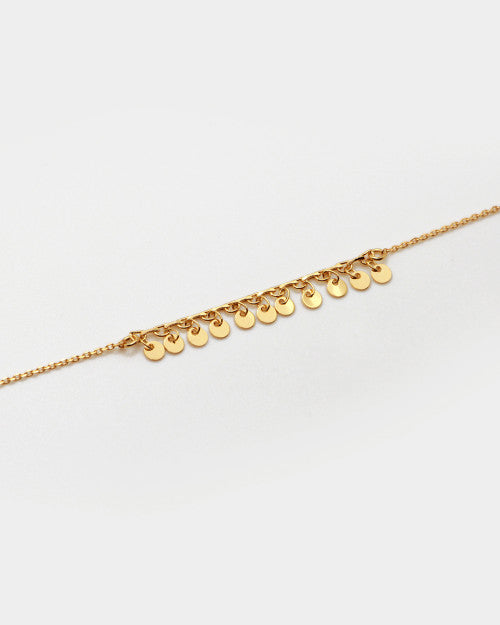 Bracelet Nilaï chaine fine orné pampilles rondes doré