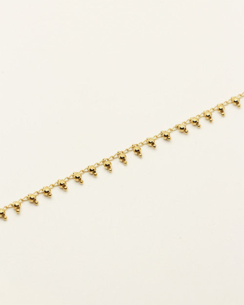 Bracelet Nilaï orné pampilles rondes or