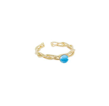 Bague Nilaï torsadée ornée pierre turquoise