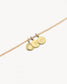 Bracelet corde beige nilai avec médailles gravées de la lettre E, un oeil et la main de fatma
