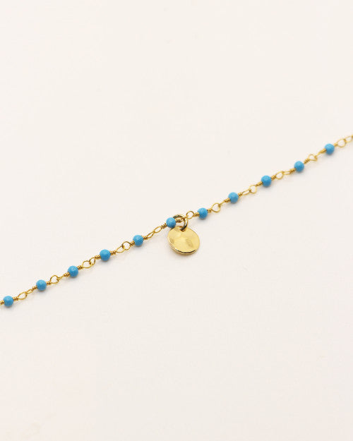 Bracelet Nilaï orné perles turquoise et petite médaille