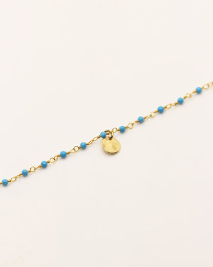 Bracelet Nilaï orné perles turquoise et petite médaille