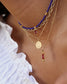 femme portant un collier astro, un collier new delhi, un collier little india et un collier pure torsadé